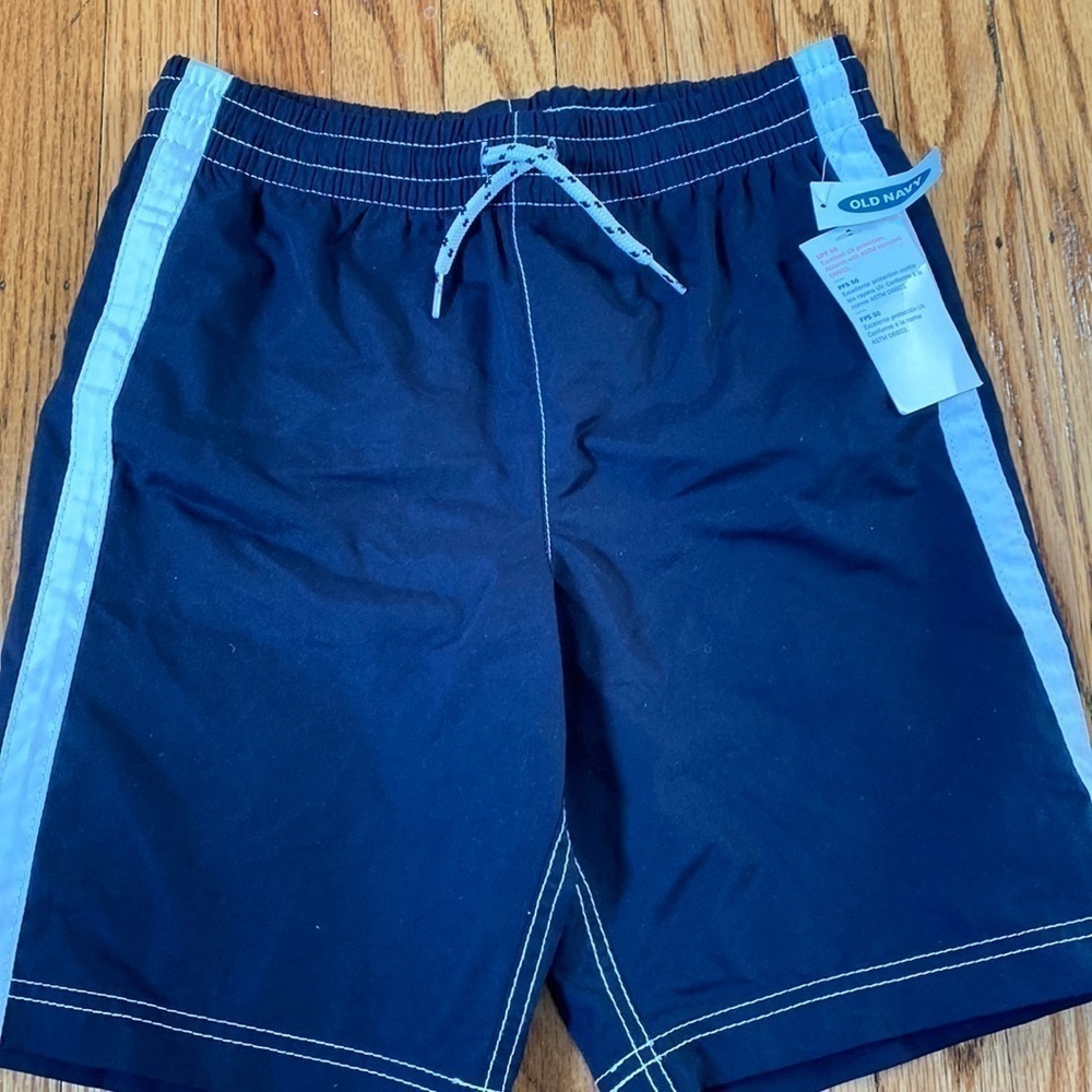 Old navy sz 10/12 navy swim trunks nwt